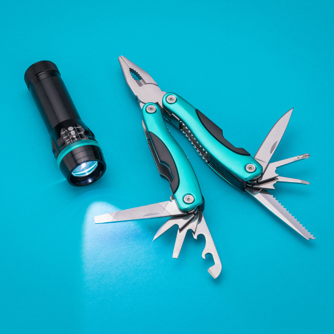 Turquoise Multi-tool and LED Torch Thumb 2